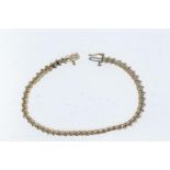 18ct gold &amp; diamond line bracelet with S-shaped spacers, tdw 1.50 carats, length 187mm, 9.58 gra