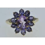 9ct gold &amp; tanzanite flowerhead ring, size N1/2, 2.9 grams