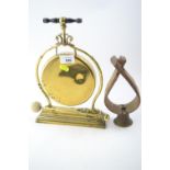 Brass gong and hand bell.&nbsp;