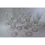 Part set of eleven Orrefors 'Linnea' pattern painted wine glasses, two AF, ht 14.5 cms