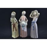 Three Lladro figures one with repairs.&nbsp;