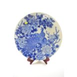 Chinese blue &amp; white charger, decorated with a peacock midst flowers &amp; foliage, diameter 39.