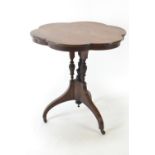 An Edwardian scallop shaped rosewood occasional table on cluster column base, with central inlaid pa