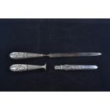 Three piece silver plated desk set inc. letter opener, pencil and pipe tamper