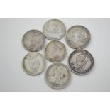 Seven Victorian coins, including three half crowns &amp; four florins