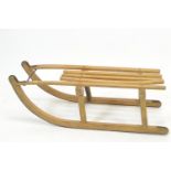 Traditional ash framed Davos toboggan, with metal runners