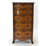 Early C20 chest of drawers in burr walnut, with crossbanded top over 5 serpentine shape drawers. Rai