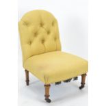 Button back bedroom chair, raised on castors