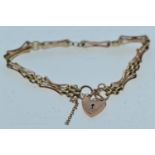 9ct gold gate link bracelet with heart clasp, 8.1 grams