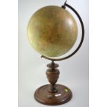 Philips 12 Inch terrestrial Globe on mahogany base with compass H50cm missing finial.