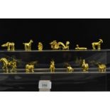Twelve Risis gilt animals representing the Chinese zodiac, height of tallest 45mm in wooden box