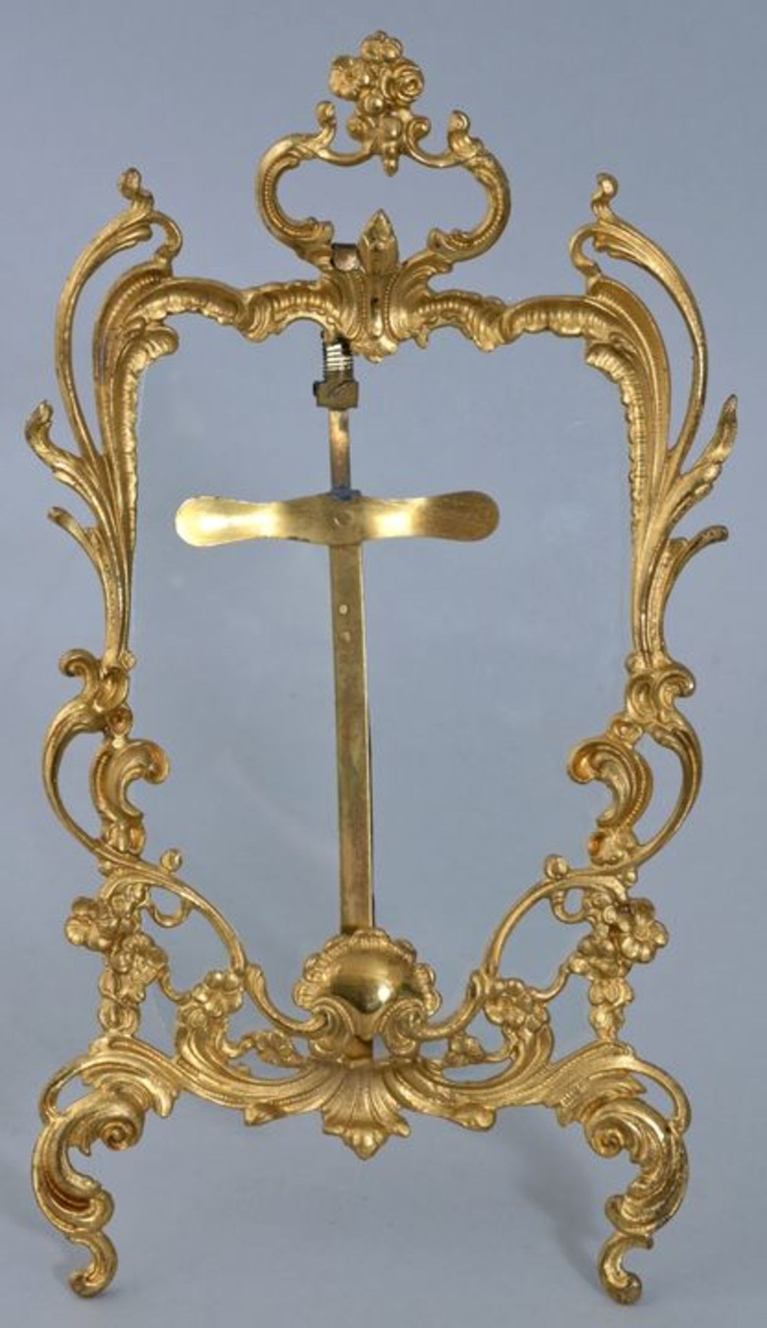 Stellrähmchen, 2. H. 19. Jh.Metallguss, reich ornamentiert in Rokoko-Ornamentik, vergoldet.