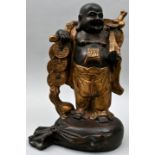 Lachender Buddha, ChinaBronze, partiell patiniert. Stehende Figur auf zugebundenem Sack, Glü
