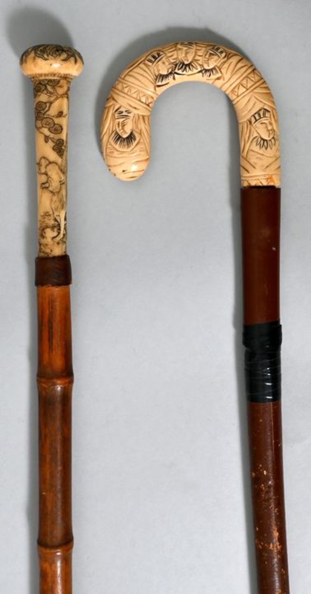 Zwei Spazierstöcke, Japan, 19. Jh.a) Pilzförmiger Knaufgriff, Elfenbein o. Bein, in detailr