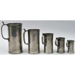 Fünf Messbecher/ measuring jugs