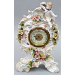 Porzellanuhr mit Putto / Porcelain clock