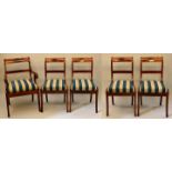 Vier Stühle und ein Armlehnstuhl / Four chairs and an armchair