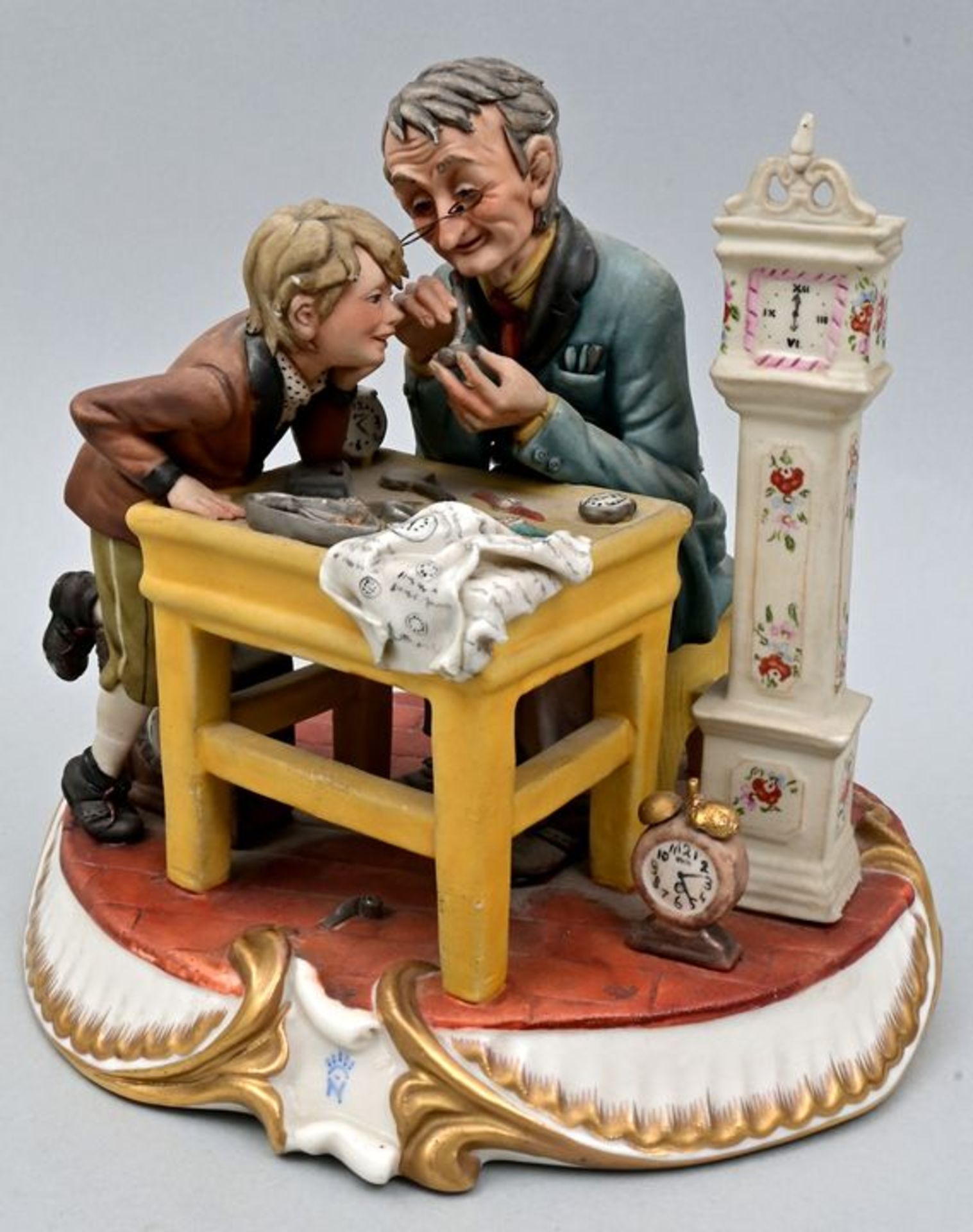 Figurengruppe "Der Uhrmacher" / Porcelain figure