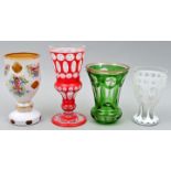 Vier Glasvasen/ Fußbecher / Four glasses with overlay decoration