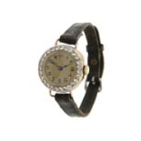 Unsigned, Lady's 18 carat gold and diamond wrist watch