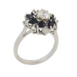 A sapphire and diamond cluster ring