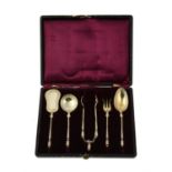 A French silver gilt serving set by Henin & Cie