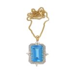 A blue topaz and diamond pendant