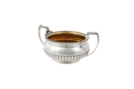 A George III silver twin handled sugar bowl by Samuel Hennell & John Terry