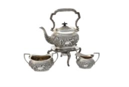 A late Victorian silver oblong baluster four piece tea set