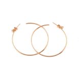 A pair of diamond accented ear hoops by Anita Ko