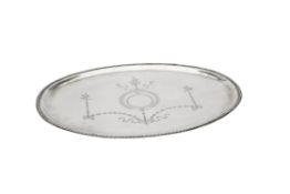 An Edwardian silver oval tray by William Comyns & Sons