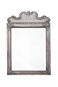 A Queen Anne style silver framed toilet mirror by Wakely & Wheeler