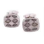 A pair of diamond cufflinks by Mouawad