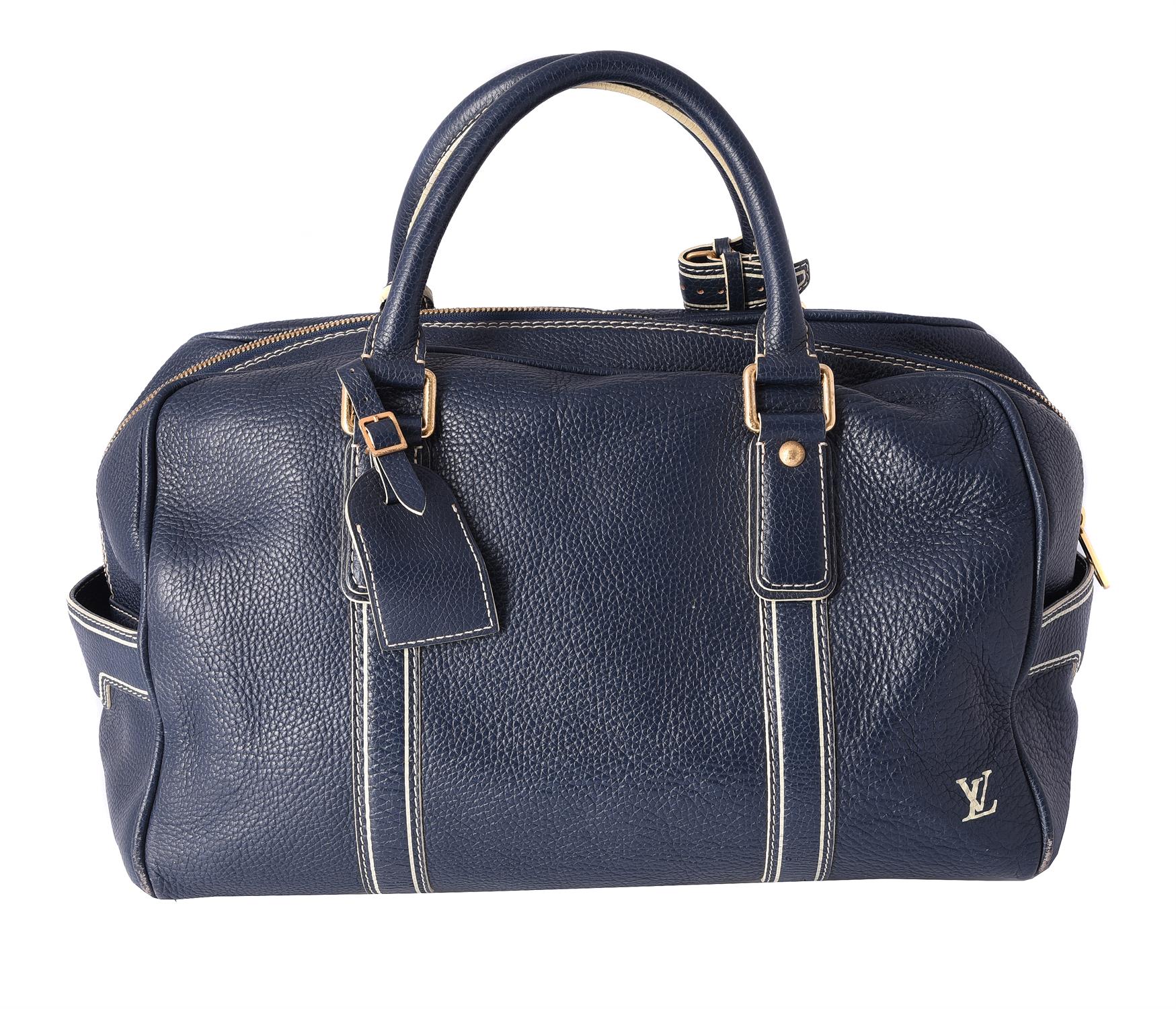 Louis Vuitton, a blue taurillon leather Keepall