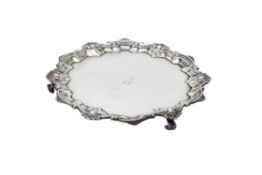 A George IV silver shaped circular waiter by William Brown