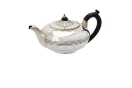 A George III silver compressed circular tea pot by Rebecca Emes & Edward Barnard I