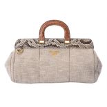 Y Prada, a beige fabric and python handbag