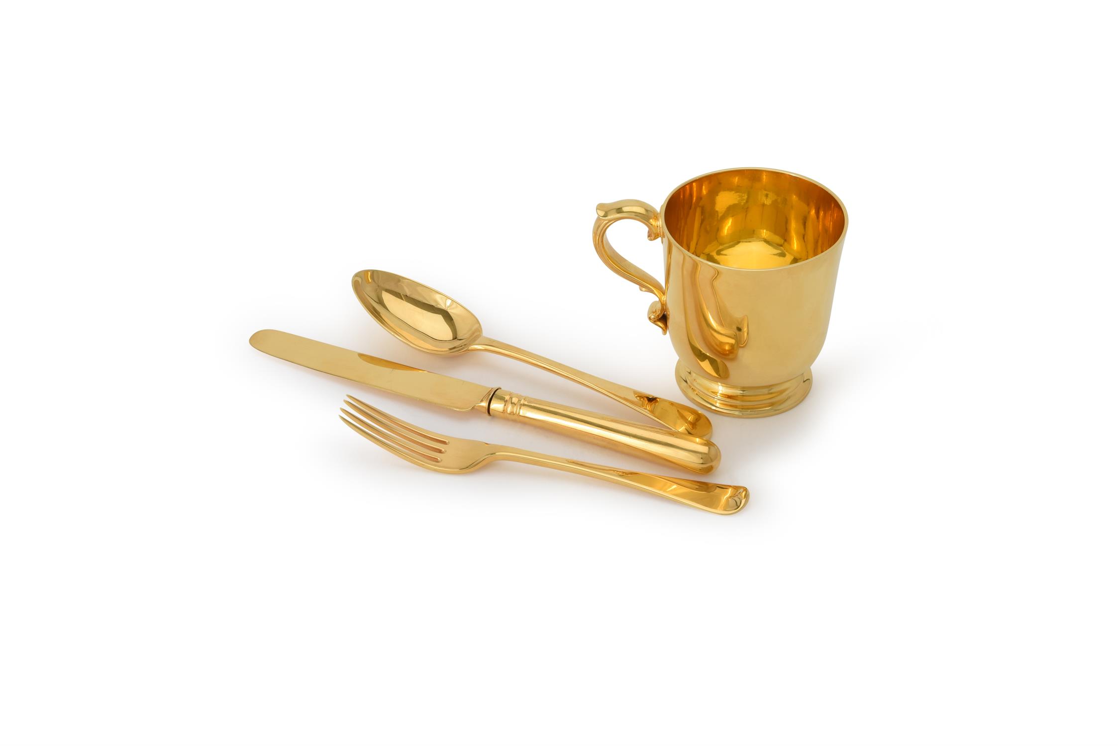 A Victorian silver gilt four piece christening set