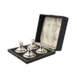 A cased set of four menu holders by Crisford & Norris Ltd.