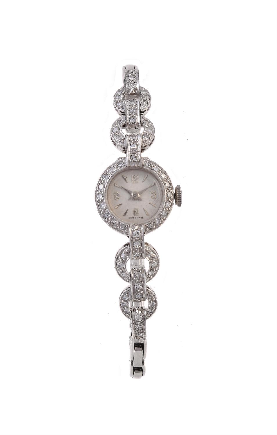 Unsigned, Lady's platinum coloured and diamond cocktail watch