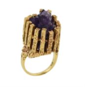 A 1970s amethyst dress ring