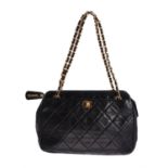 Chanel, a black quilted lambskin shoulder bag