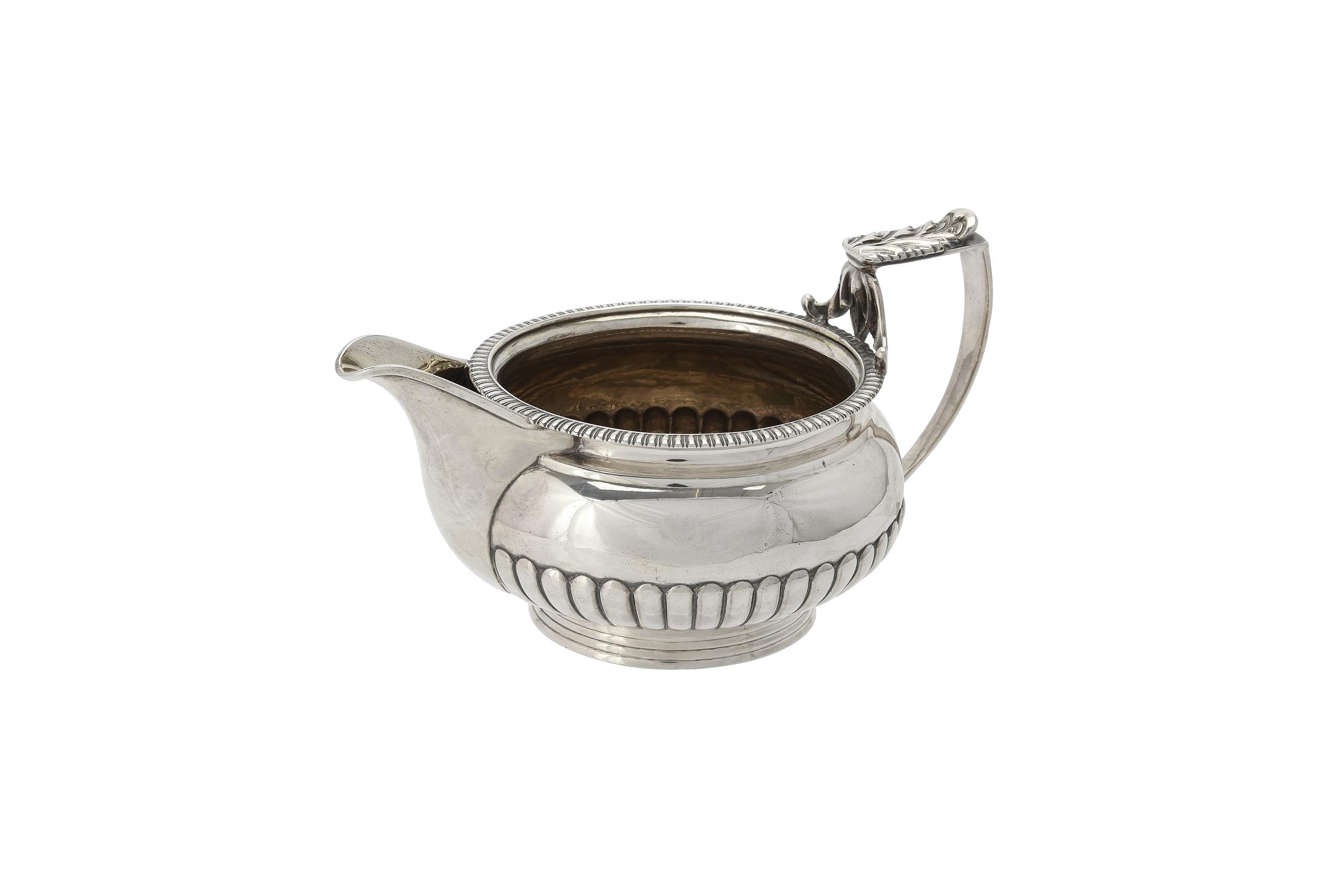 A George III silver half lobed cream jug by Samuel Hennell & John Terry