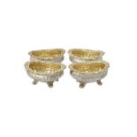 A set of four George IV shaped oval salts by Joseph Angell I