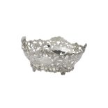 A silver oval pierced bowl by C. S. Harris & Sons Ltd.