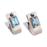 A pair of two colour blue topaz cufflinks by Trudel