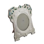 An Art Nouveau silver mounted and enamel shaped square photo frame by William Hutton & Sons Ltd.