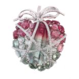 A diamond and tourmaline wrapped heart brooch