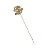 An early 20th century demantoid garnet stickpin