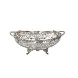 A silver twin handled oblong fruit bowl by Goldsmiths & Silversmiths Co. Ltd.